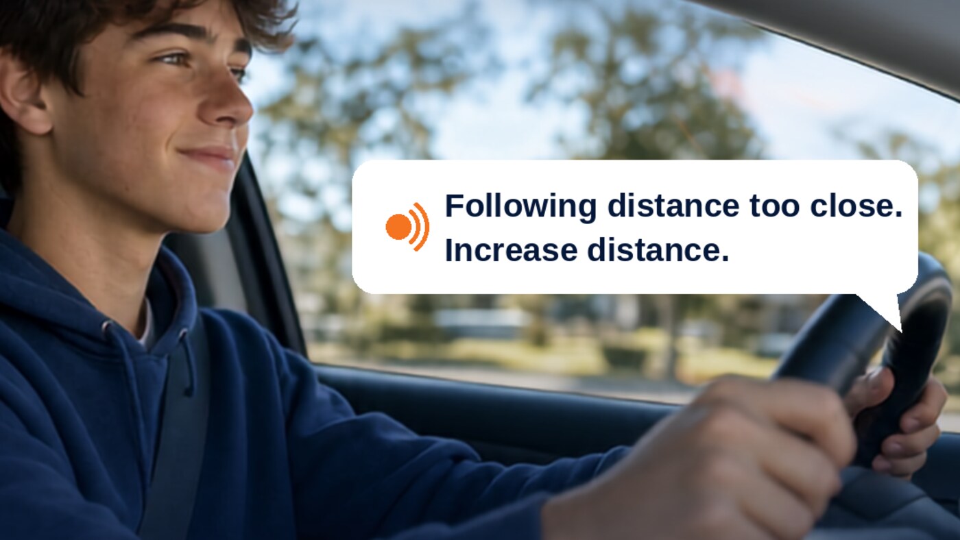 Teen driving with seatbelt on while TruceVision speaks a reminder in the car